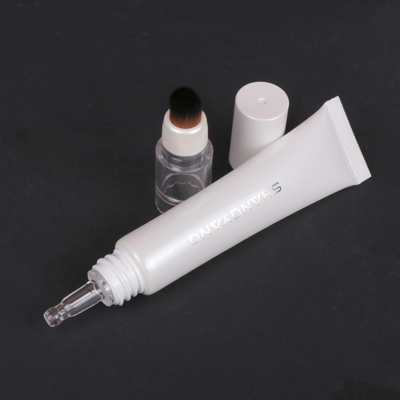 Concealer tube with brush