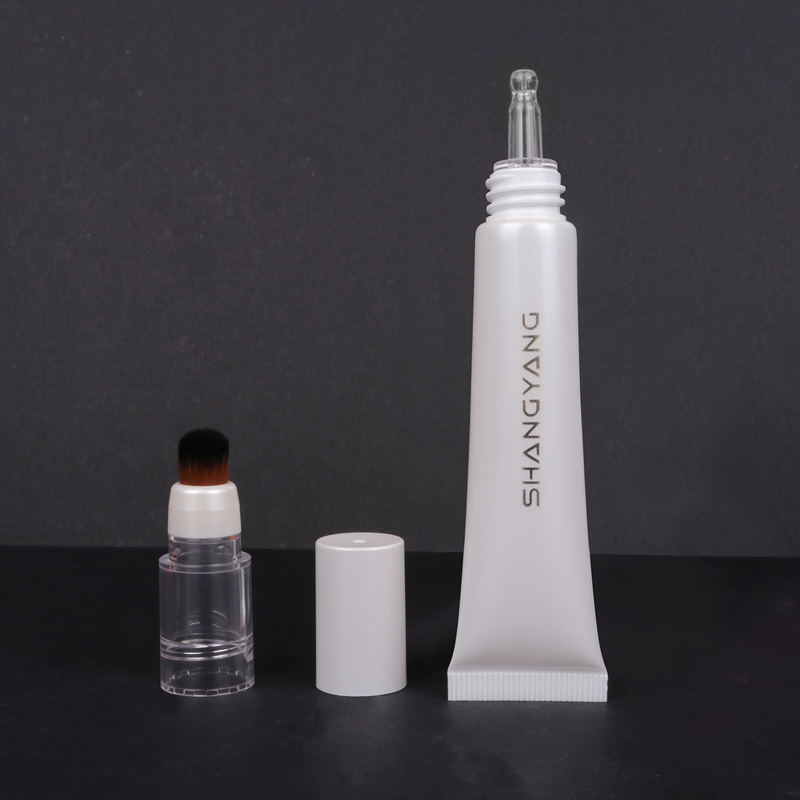 Concealer tube with brush